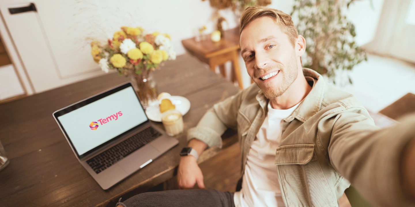 selfie-portrait-handsome-young-man-taking-picture-himself-cafe-with-laptop-smiling